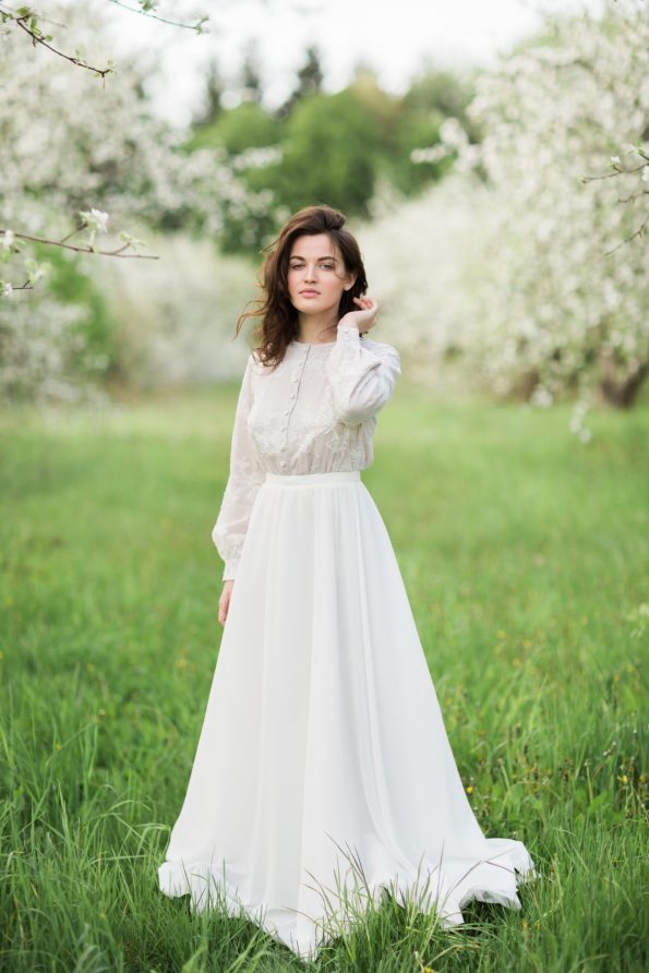 Lace shirtwaist wedding dress with layered skirt | Cathy Telle