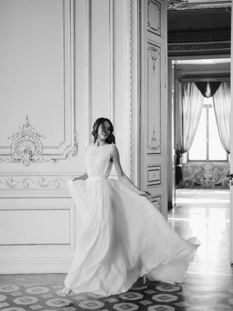 Off-white wedding gown with sheer embroidered back | Cathy Telle